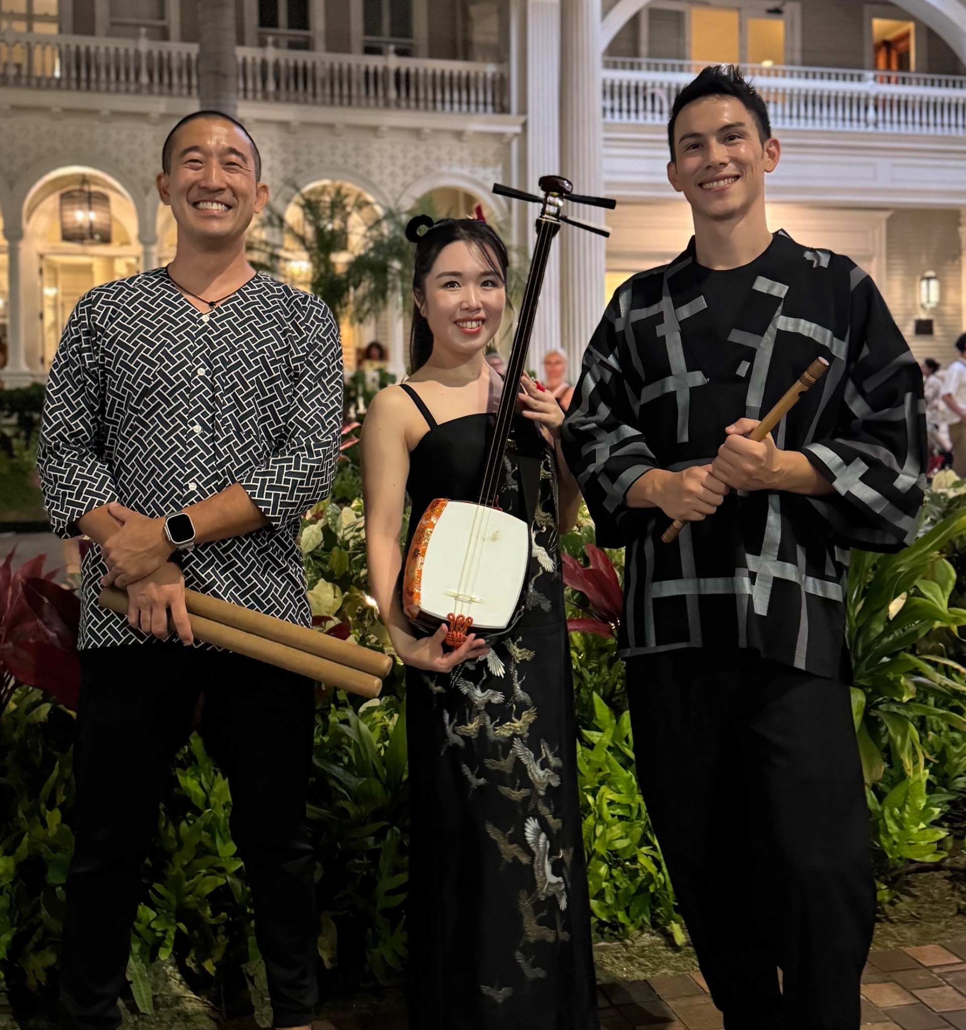 Mikey Gonhata, Anju Madoka, and Sho’on Shibata of MikAnS together after a performance