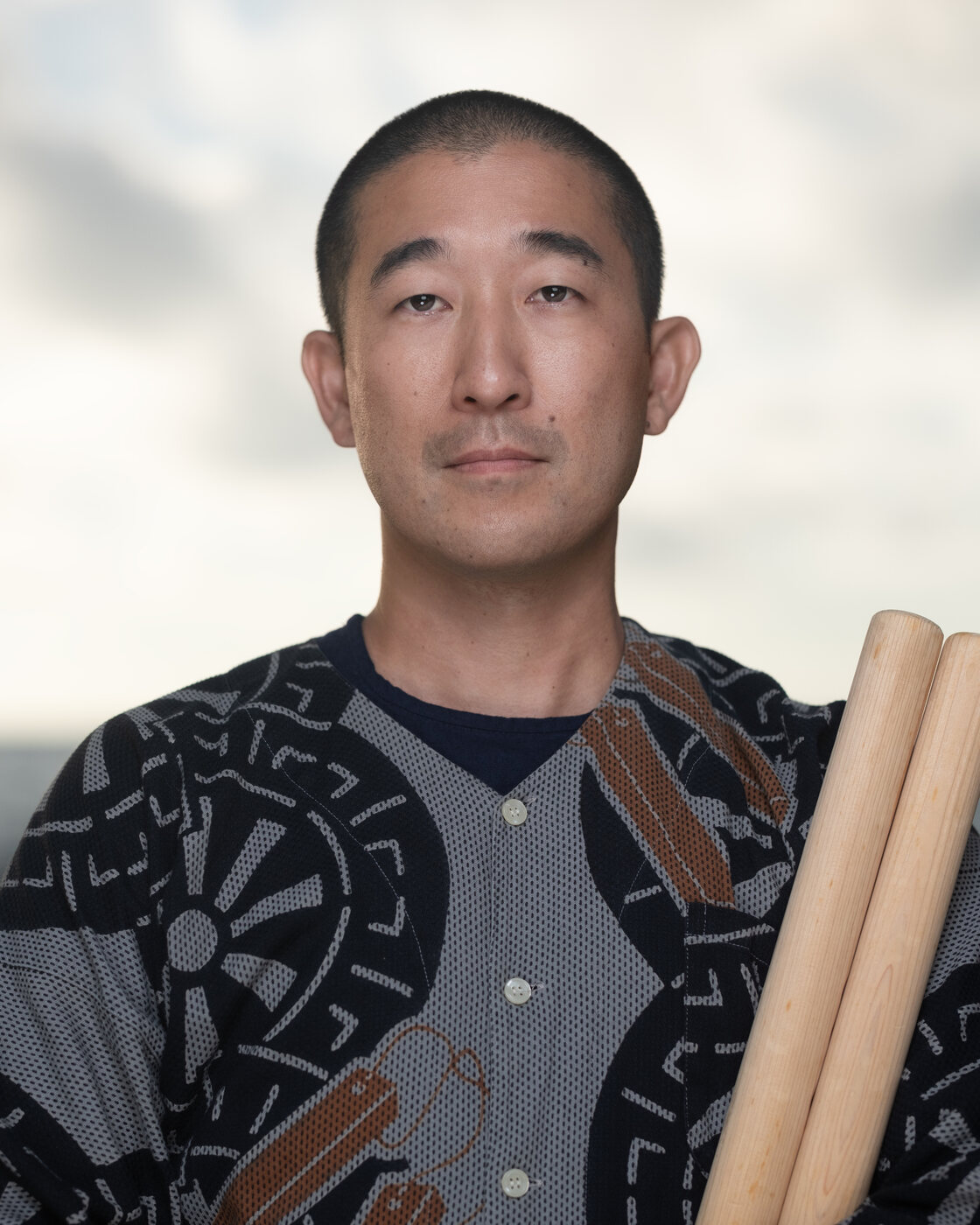Mikey Gonhata holding bachi